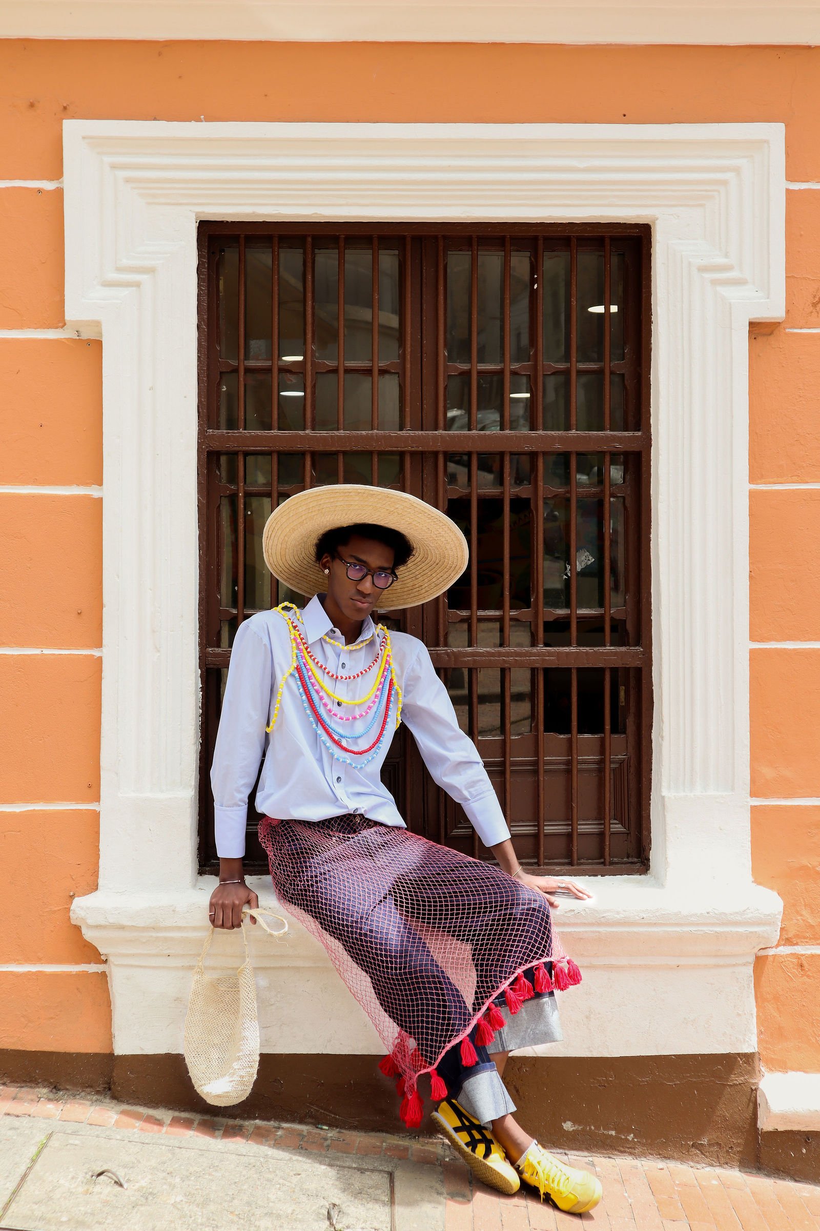 Look del pescador sentado